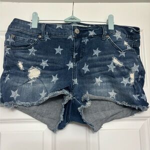Torrid faded star Jean shorts with fraying details. Size 14 barely worn